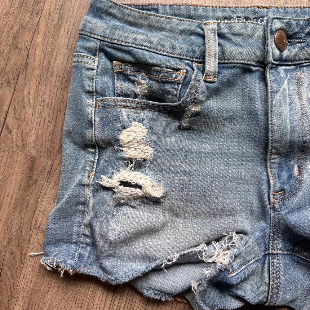American Eagle Outfitters Light Blue Distressed Hi-Rise Shorties - Size 6 - Picture 5 of 14